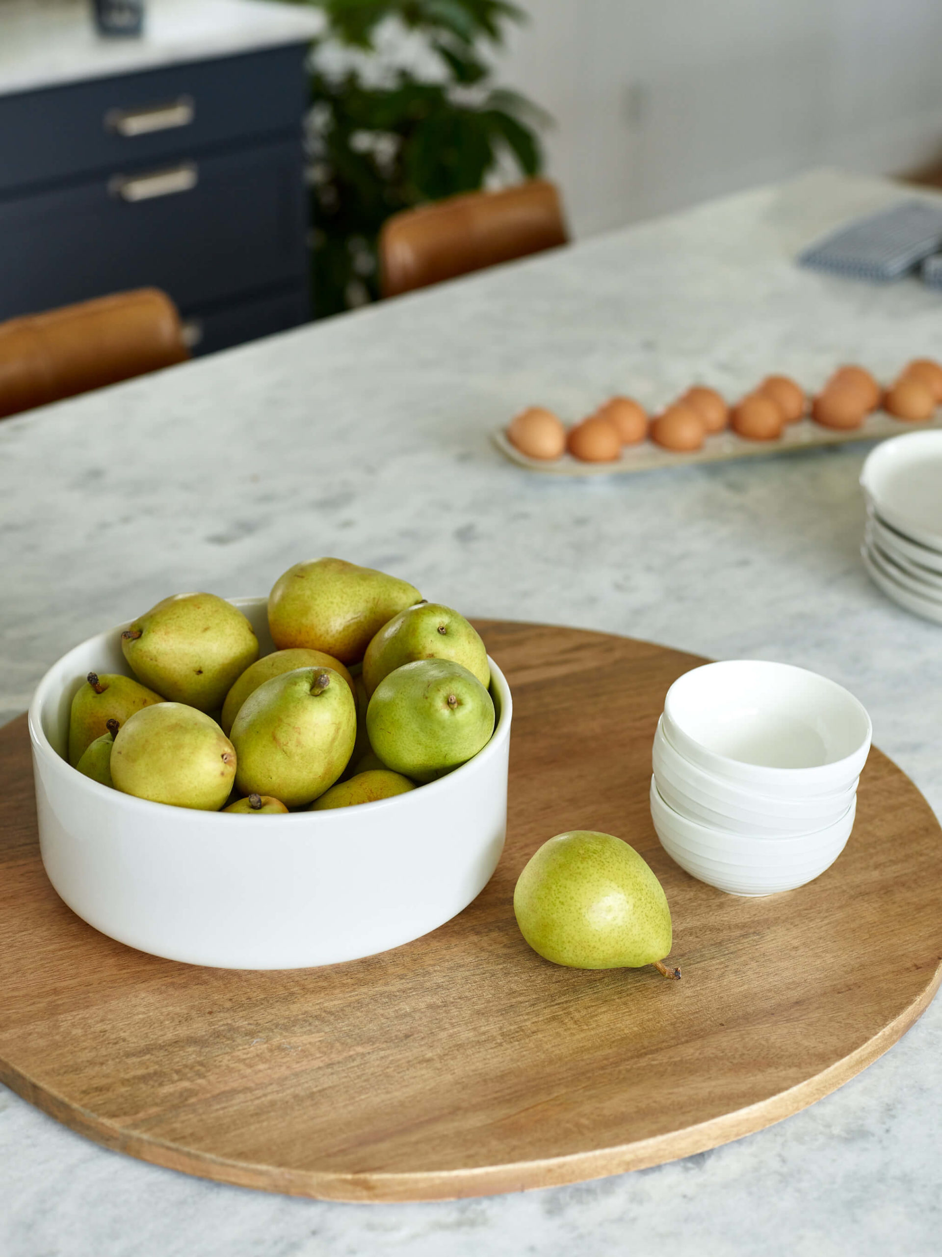 Blue Kitchen, blue cabinets, salvaged lighting , West Elm Slope stool, white quartzite, quartzite counters, large round cutting board, farmhouse eggs, food photography, flatlay interior, farmhouse kitchen, farmhouse interior, house interior, kitchen blog, home blog